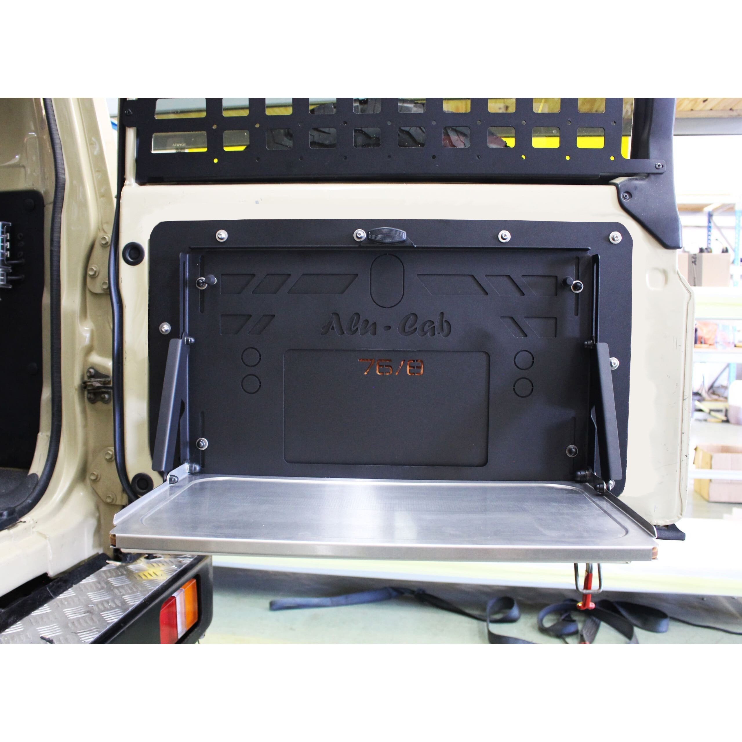 76-78-Rear-Door-Drop-Down-Table-1.jpg RC-LC-A-DDT-MNT-KIT - REAR DOOR DROP DOWN TABLE MOUNT - LC76/78 - Image 1